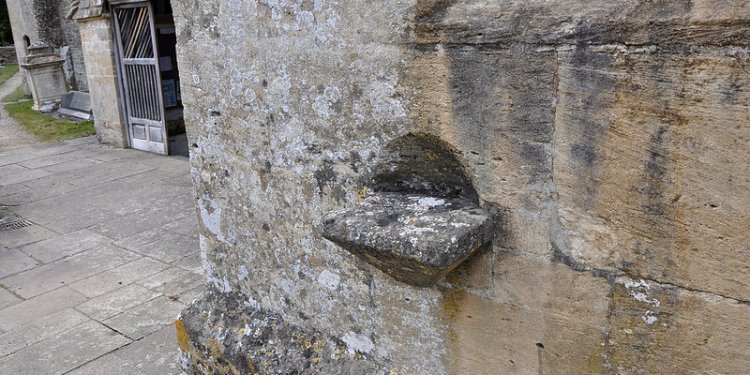 North Cerney Holy water stoop south wall of south transept -